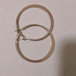 Big silver hoop earrings